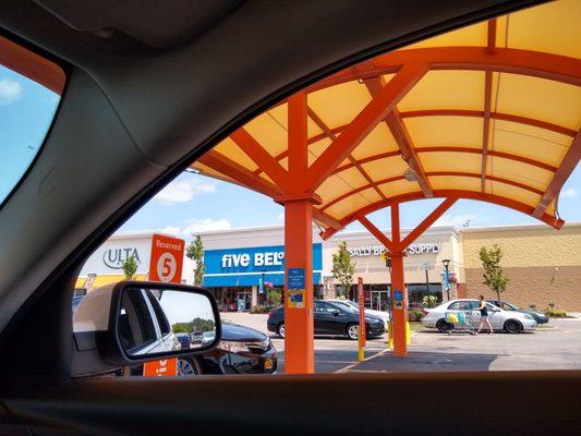 Under the grocery pick-up canopy, quiet today.