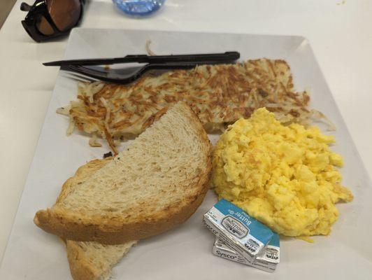 Eggs, Hash Browns and Sourdough Bread.