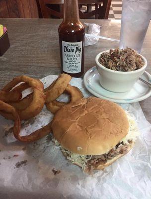 Jumbo Pig Sandwich, Housemade Onion Rings, and our world famous Dixie Pig Sauce.