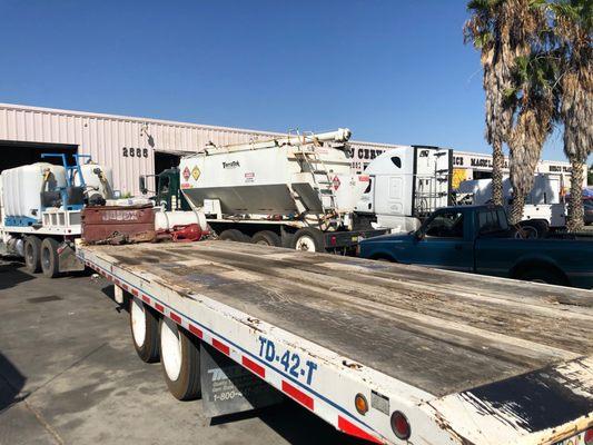 Heavy duty flat bed getting repairs