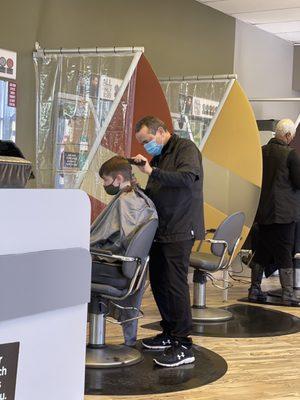 Boy getting haircut