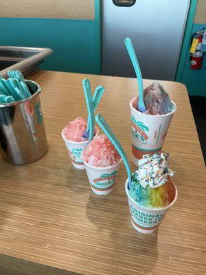 One Large Cotton Candy Confection with Pop Rocks, one Baby Unicorn, and two Baby Strawberry with Pink Lemonade Snow-cones