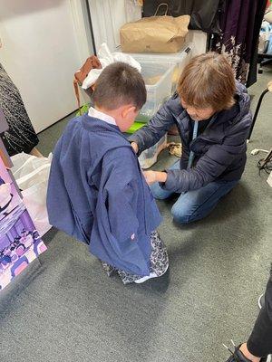 My son trying a kimono for his shichigosan ceremony.