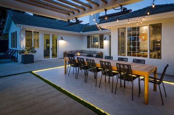 Herringbone tile for dining area. Cantilever patio with heaters and lighting.