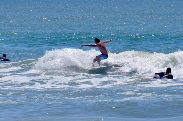 Surfing doctor at New Smyrna Beach Inlet.