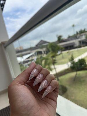 Clear stiletto nails with rose gold flakes $65