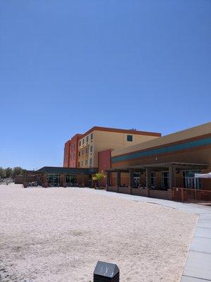 Outdoor patios for the bar/lounge and restaurant right on the beach in front of the water