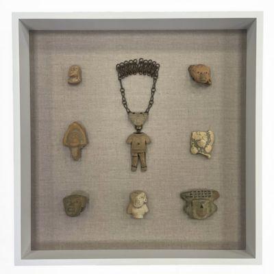 A custom shadowbox for a collection of Mesoamerican artifacts