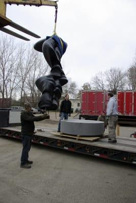 Fitting a Tony Cragg sculpture on base, Minneapolis