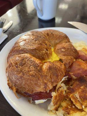 Bacon, egg and cheese on a croissant.