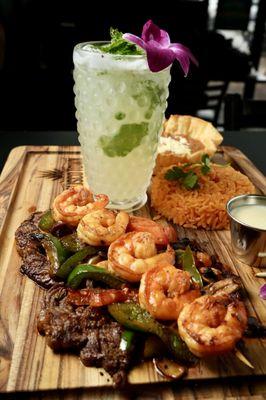 This is our amazing Steak with Shrimp along with our delicious Mojito