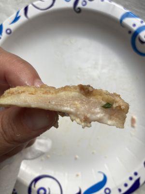 Rare chicken cutlet in my sandwich