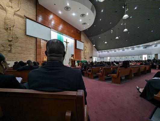 Inside. Mass led by Fathers Sebastian Okoye and Joseph Arulraj.