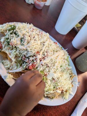 Shredded chicken nachos supreme