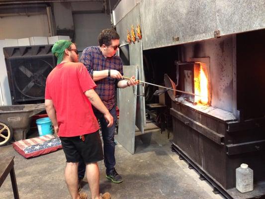 Kyle, our instructor assisting during a glassblowing class.