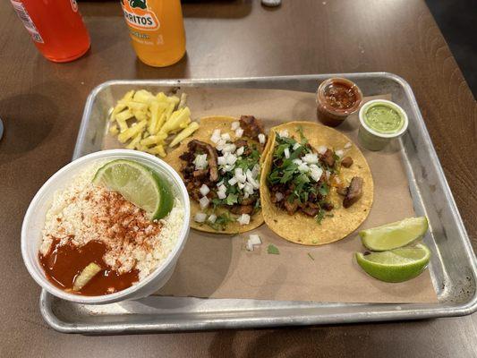 Al pastor tacos, elotes