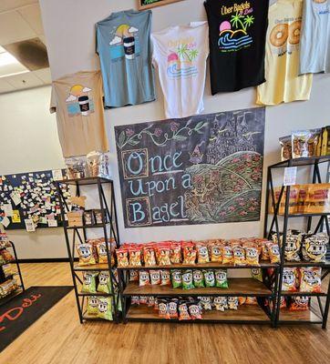 Uber Bagels of Severna Park. | merchandise wall and snacks; check out their community board!