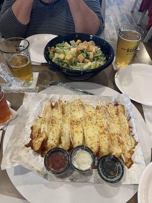 thick bread and caesar salad