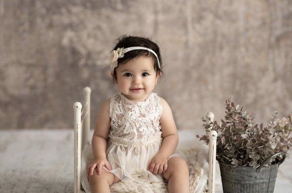 Classic portraits are included with 1st birthday cake smash sessions.