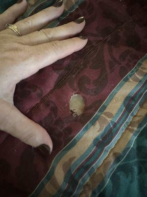 hole in bedspread