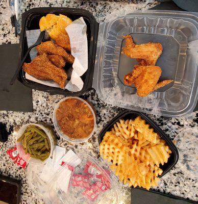 Fried catfish, fried chicken, french fries, pineapple yams, cornbread muffin and green beans.