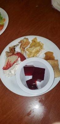 Strawberry shortcake, banana pudding, bread pudding, peach cobbler and red jello.