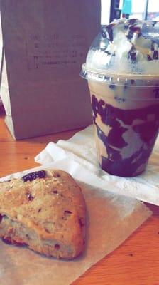 "Panda" iced latte and a cherry scone.