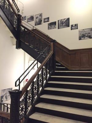 Exhibition of Teenie Harris prints on the staircase.