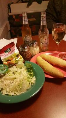 Caesar salad & bread sticks with bonus human hair.