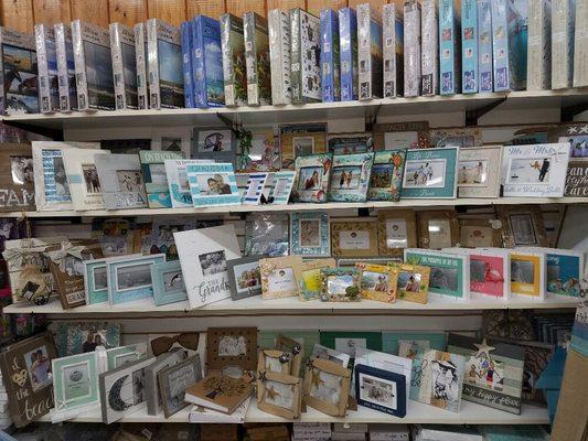 Large selection of picture frames and puzzles