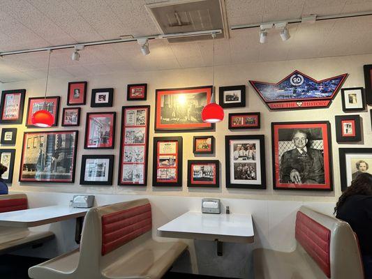 The wall of photos from the restaurant.