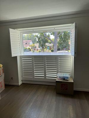 Plantation shutters on a 6'x8' window.