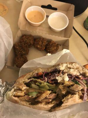 Not the prettiest pic, but pretty good. Schwarma pita and side of falafel