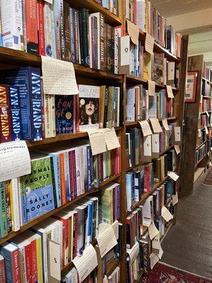 Shelves upon shelves of books with handwritten synopsis' and reviews!