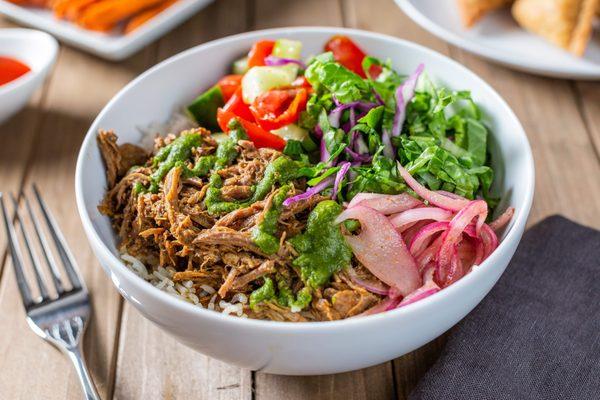 Lamb Curry Rice Bowl ... imported shredded lamb over a bed of basmati rice + condiments & sauces