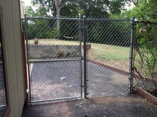 Our new house did not have a fence, so they connected a new one to the house (per my request)