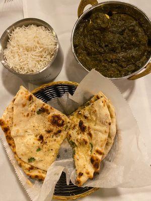 Saag Paneer was pretty bland (3/5), garlic naan (5/5)