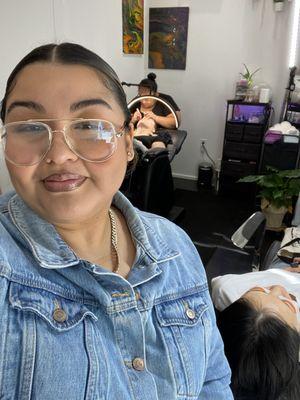 Hi  My name is LETI that's my friend in the back Adriana she does Lash Extensions. 
Her IG:Adrianaartistry