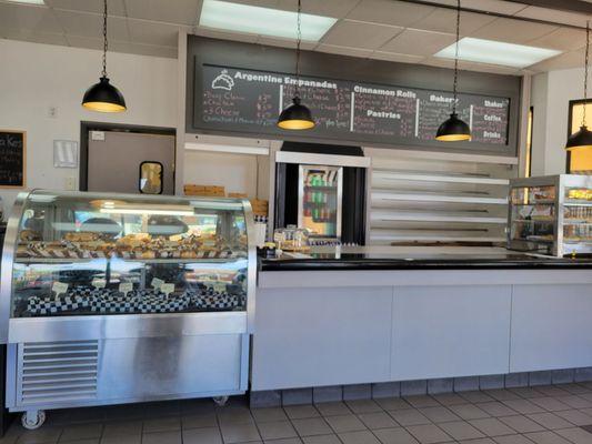 Displayed pastries & menu board.