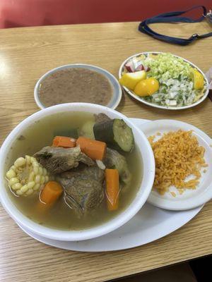 Caldo de Res with a side of beans