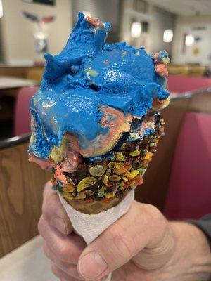 Superman Ice cream in a chocolate dipped fruit pebbles waffle cone... BF was in heaven!