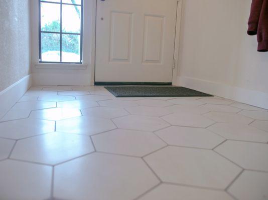 This white hexagonal tile from Interceramic's Construct line adds a touch of modern flair to this contemporary home.