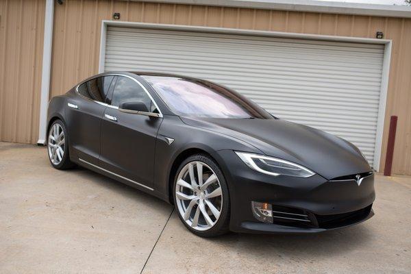 Tesla Model S with a full-body satin paint protection film wrap and the finest coating system in the world: Modesta!