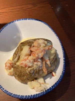 Lobster stuffed baked potato