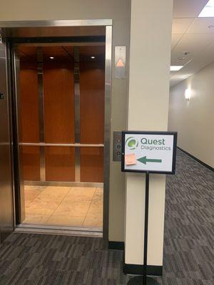 Elevator to the second floor where Quest is located as indicated by the sign.