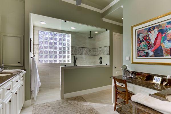 This shower was also completely redone with a new rain shower head, a new shower bench, and new tile for walls and floor.