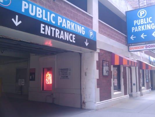 Tender Car Auto Detailing is inside of a parking garage. It has no signage for the detailing place on the exterior.