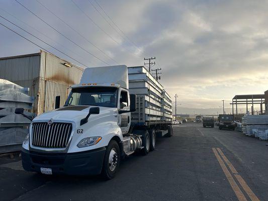 Full load of freshly galvanized steel headed out to a job site.