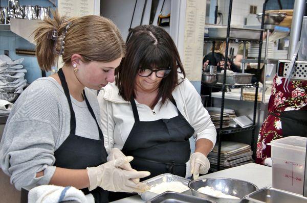 Mom and Daughter participating in a baking class