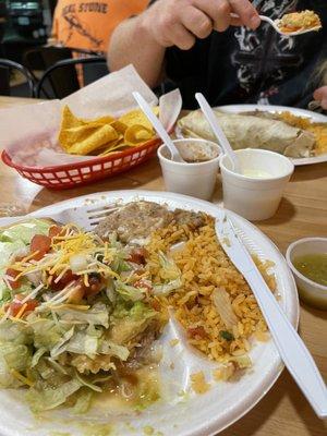 Shredded chicken chimichanga and a very large burrito in the back.